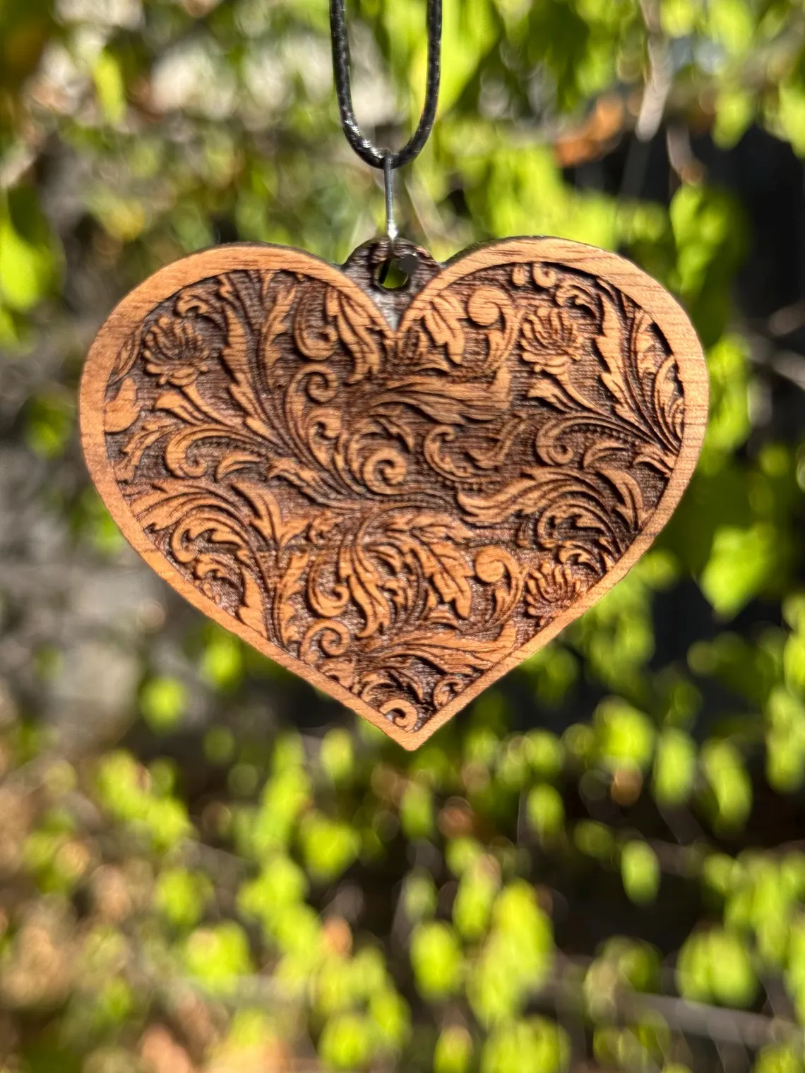 Tooled leather-pattern heart pendant